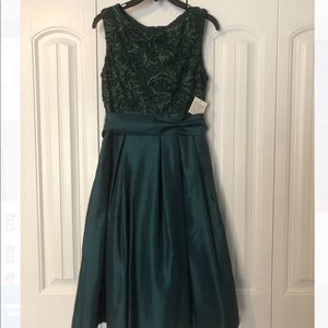 Emerald green tea length cocktail dress